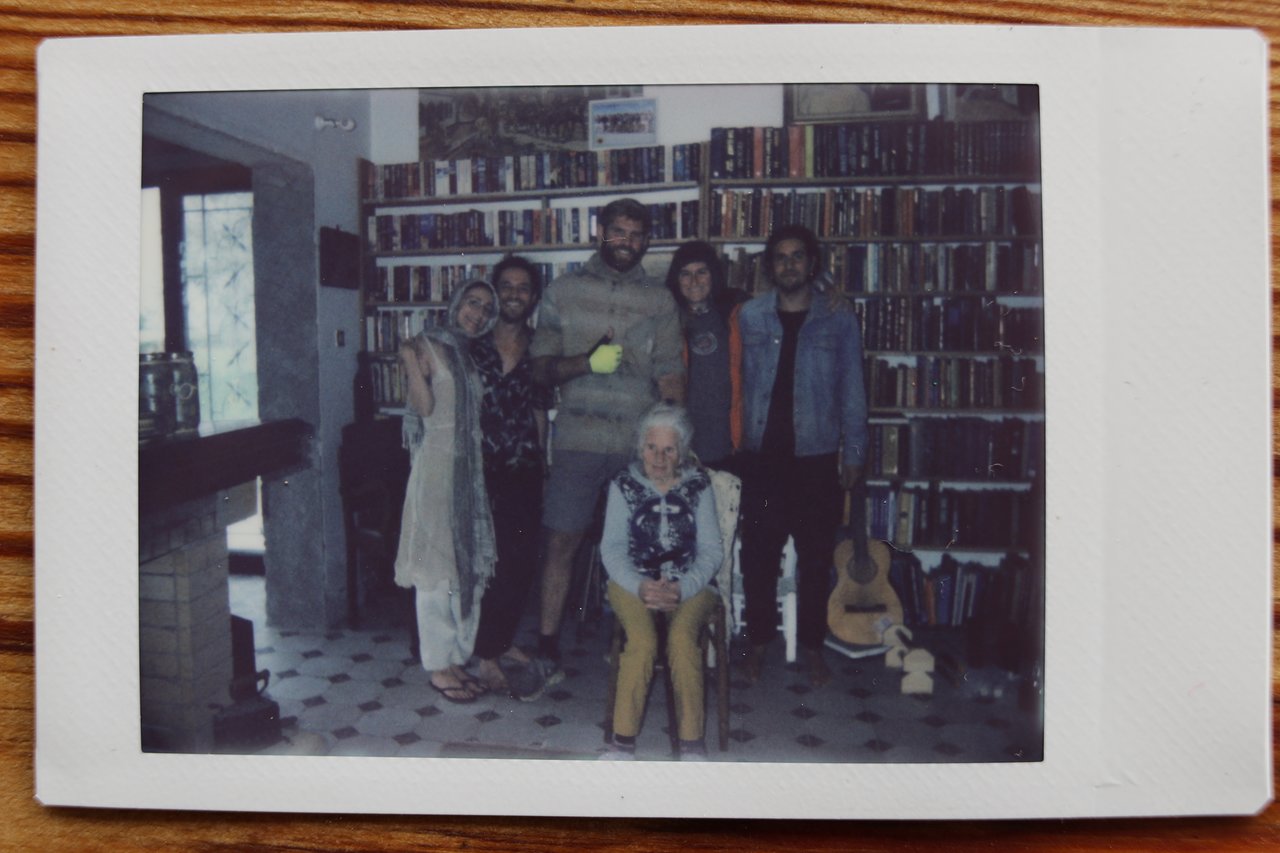 Polaroid of Dylan with volunteers